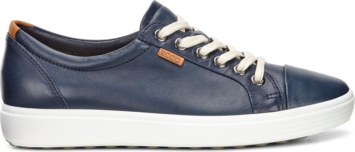 A blue leather sneaker with white laces and a white sole.