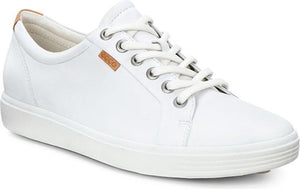 White leather sneaker with white laces and a flat white sole.