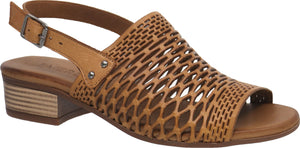 A tan sandal with a geometric design, a buckled strap, and a low heel.