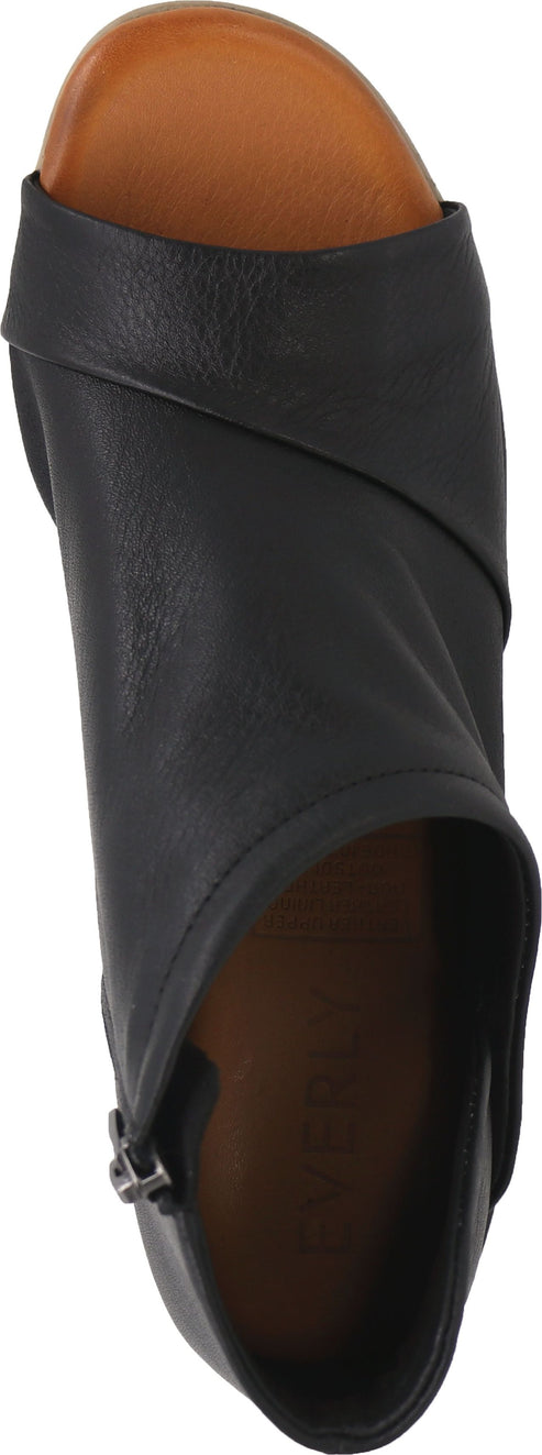 A black high-heeled peep-toe sandal with a tan sole.