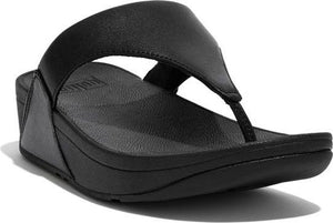 Black thong sandal with a wedge heel.
