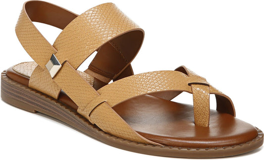 Tan sandal with patterned straps crossing over the foot and an ankle strap with a buckle.