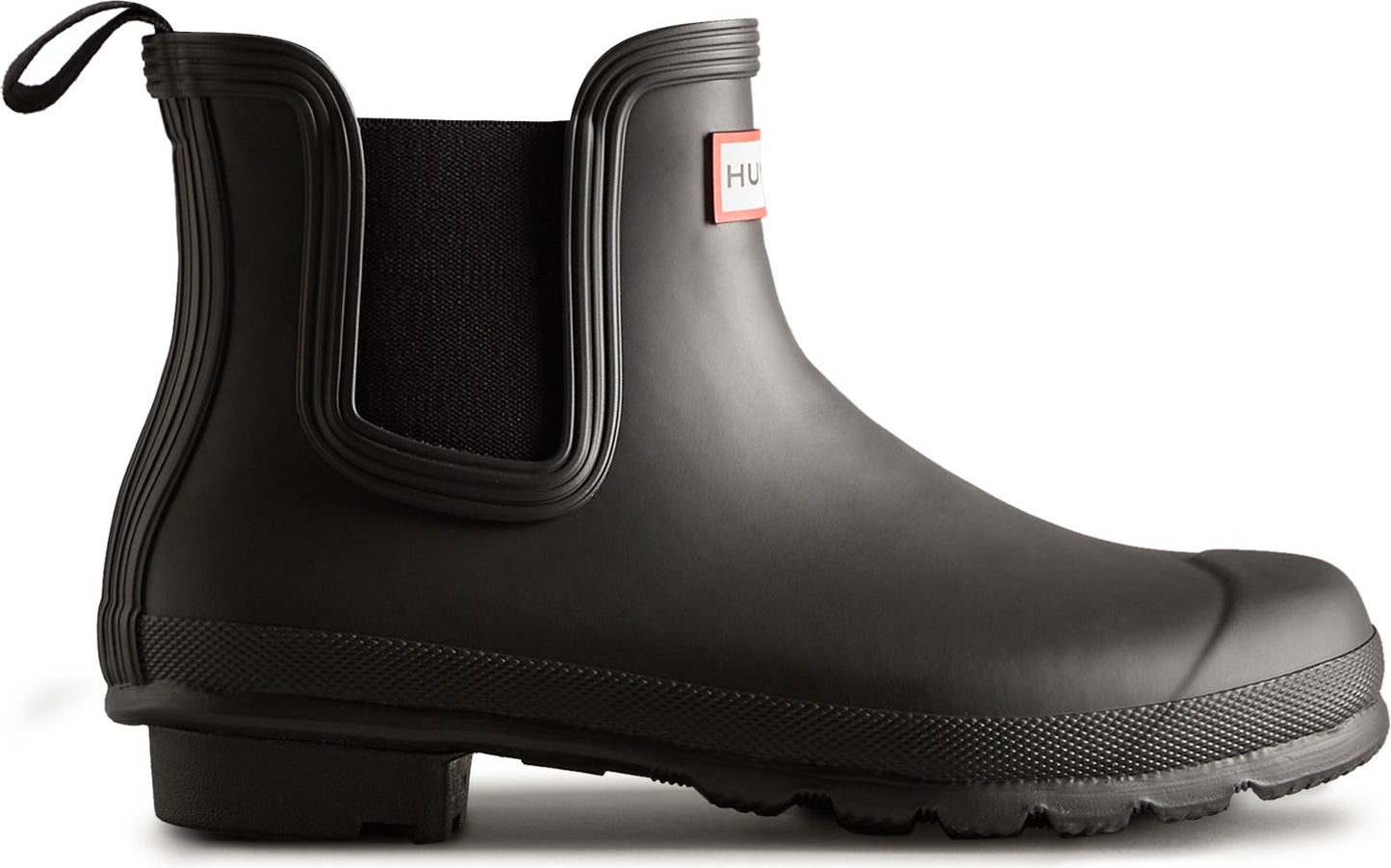 Black waterproof ankle boot with elastic side panel and heel pull tab.