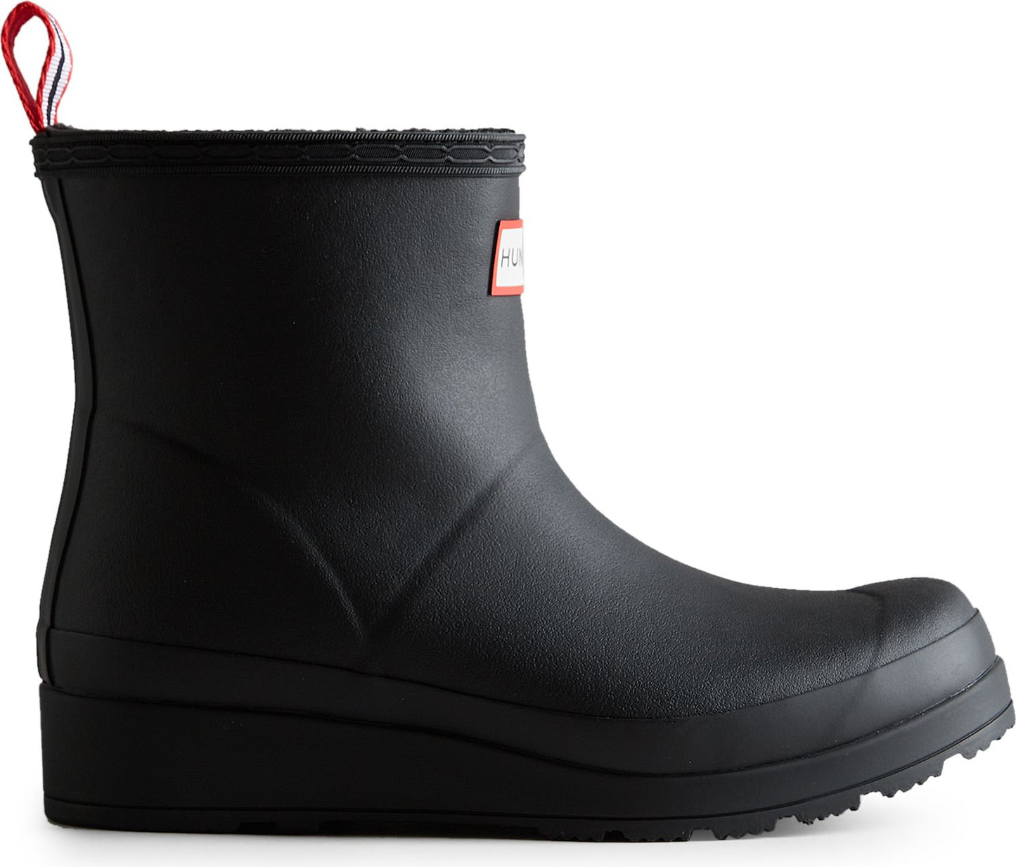 Black, ankle-height rain boot with red and white heel pull tab.