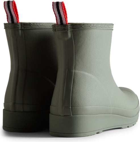 Back view of olive green rubber rain boots with striped red, white, and black pull tabs.