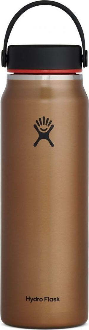 A brown flask with a black lid and handle, featuring a logo and the text "Hydro Flask".