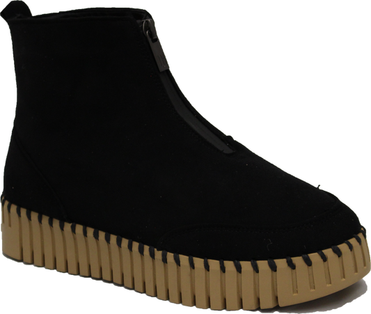 Black ankle boot with a front zipper and beige sole.