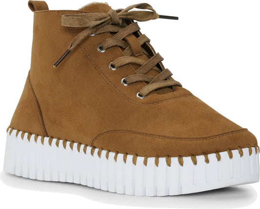Ankle-high tan lace-up sneaker boot with a thick, white, ridged sole.