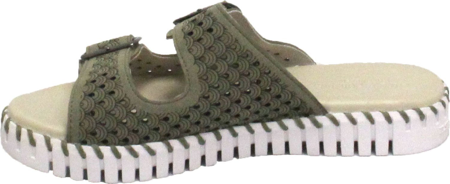 A slide sandal featuring a green perforated upper and a white ridged sole.