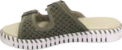 A slide sandal featuring a green perforated upper and a white ridged sole.