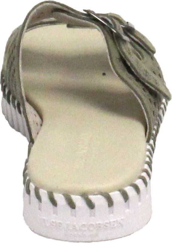 Sandal with adjustable buckle strap over the instep, textured footbed, and thick white sole with visible stitching.
