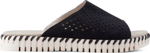 A black slip-on sandal with a white platform sole and perforated upper.