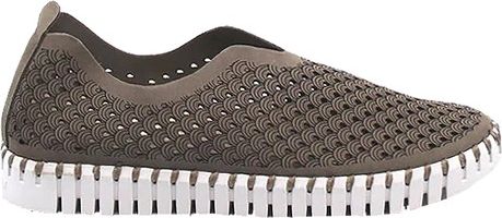 A slip-on shoe with a gray, patterned upper and a white, segmented sole.