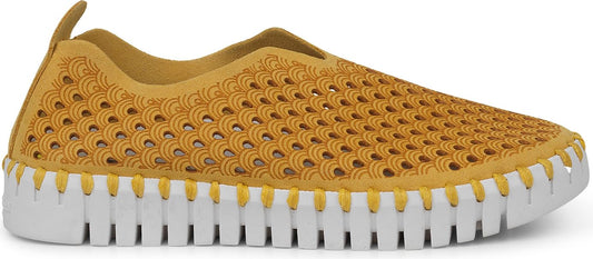 A yellow slip-on shoe with a white sole.