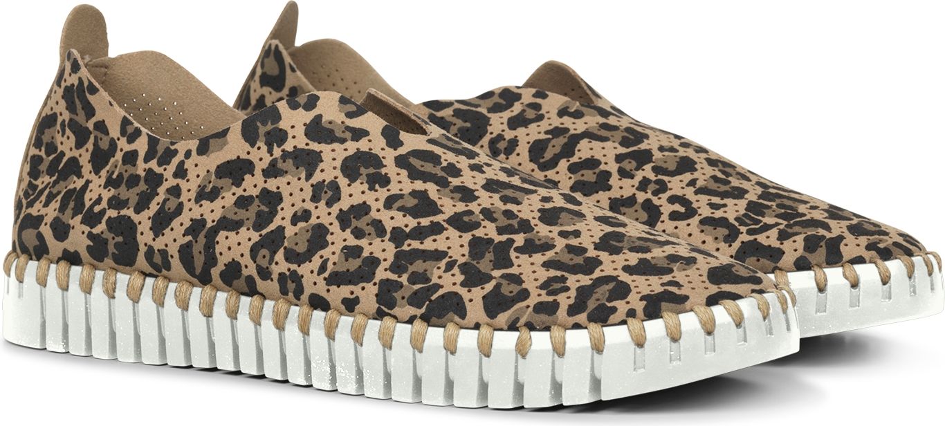 Leopard print slip-on sneakers with a white sole.