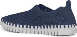 Navy blue slip-on shoe with a perforated design and white ridged sole.