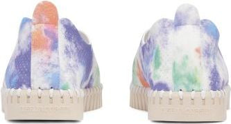 Back view of two sneakers with tie dye pattern and beige soles.