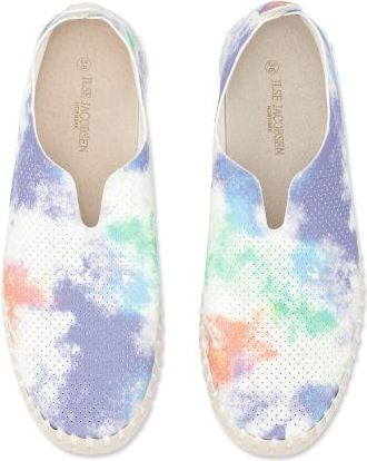 Pair of slip-on shoes with tie-dye pattern and cream-colored soles.