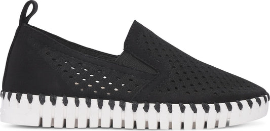 A black slip-on shoe with a white treaded sole.