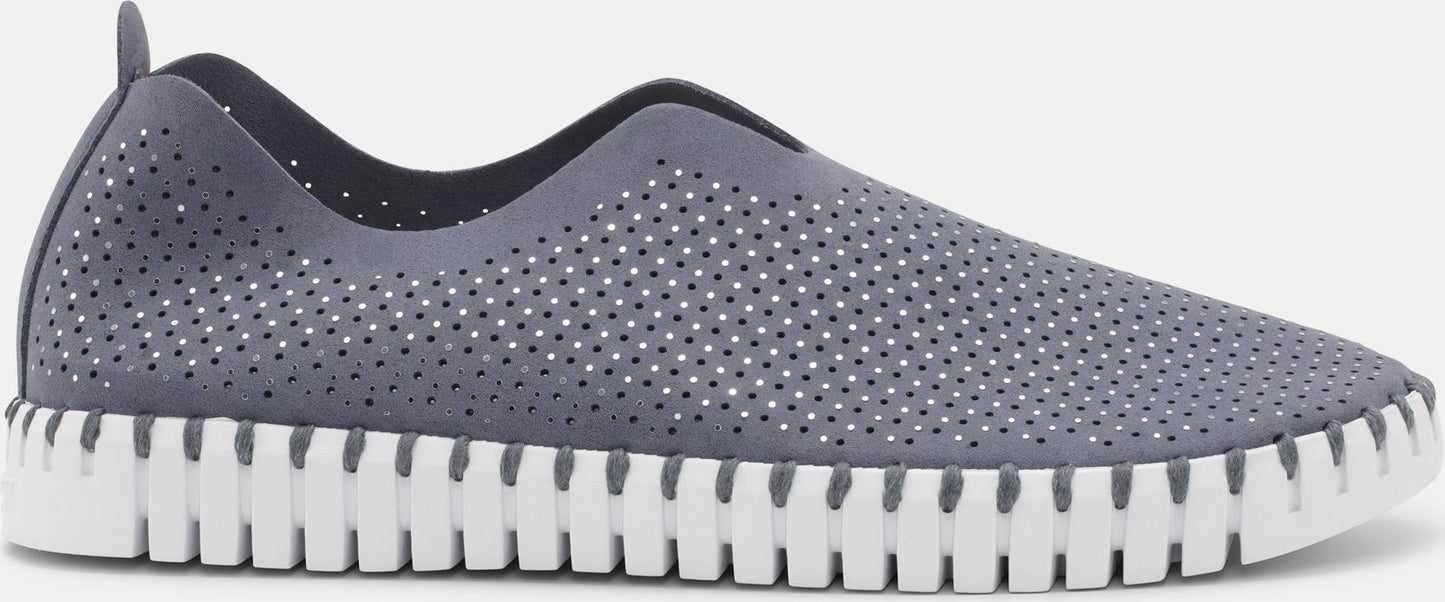 Gray slip-on shoe with white sole and small holes.