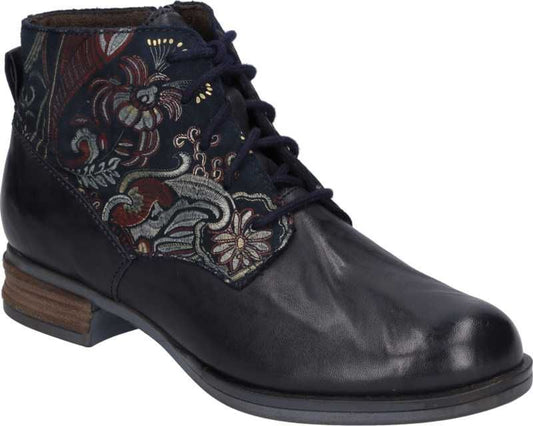 Black leather ankle boot with floral tapestry upper and block heel.