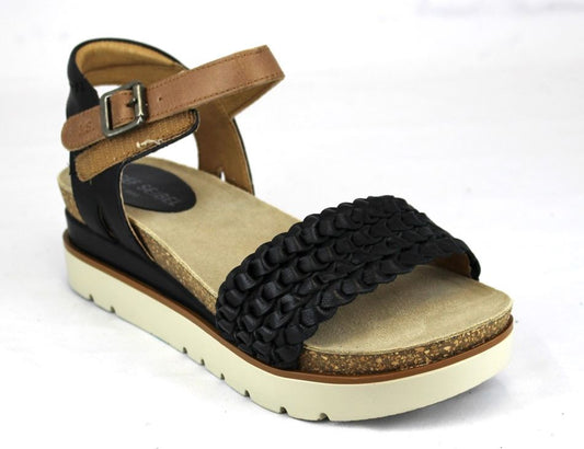 Black and tan ankle strap platform sandal with woven strap.