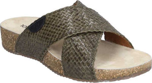 Cross-strap women's slide sandals in textured green with a tan cork sole.