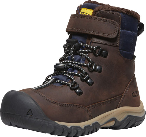 Brown high-top boot with black toe bumper, tan sole, black and white striped laces, brown velcro strap, and navy blue padded collar.