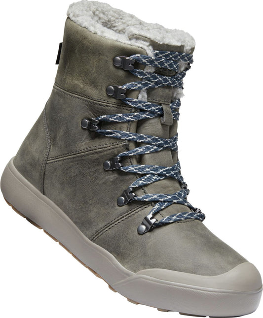 Gray leather boot with gray and white laces and faux fur lining.