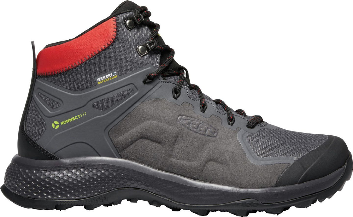 A gray hiking boot with black soles, black laces, and a red padded ankle.