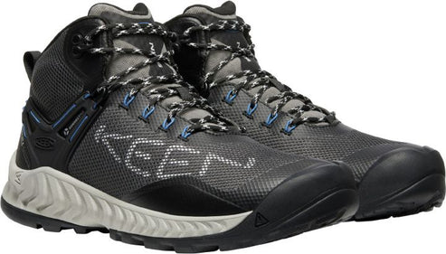 A pair of high-top hiking shoes, black with gray and blue accents, featuring a bold logo.