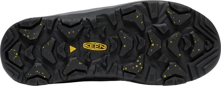 A shoe sole with black textured tread pattern and yellow accents.