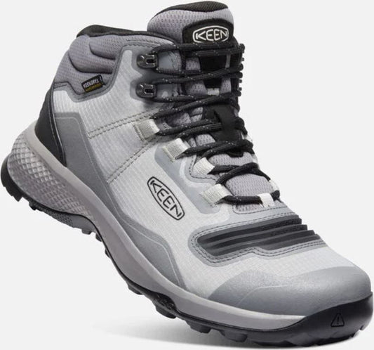 Light gray mid-height hiking boot with gray accents, black laces, and a KEEN logo.