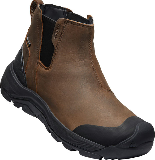 Brown leather Chelsea boot with black sole and toe cap.