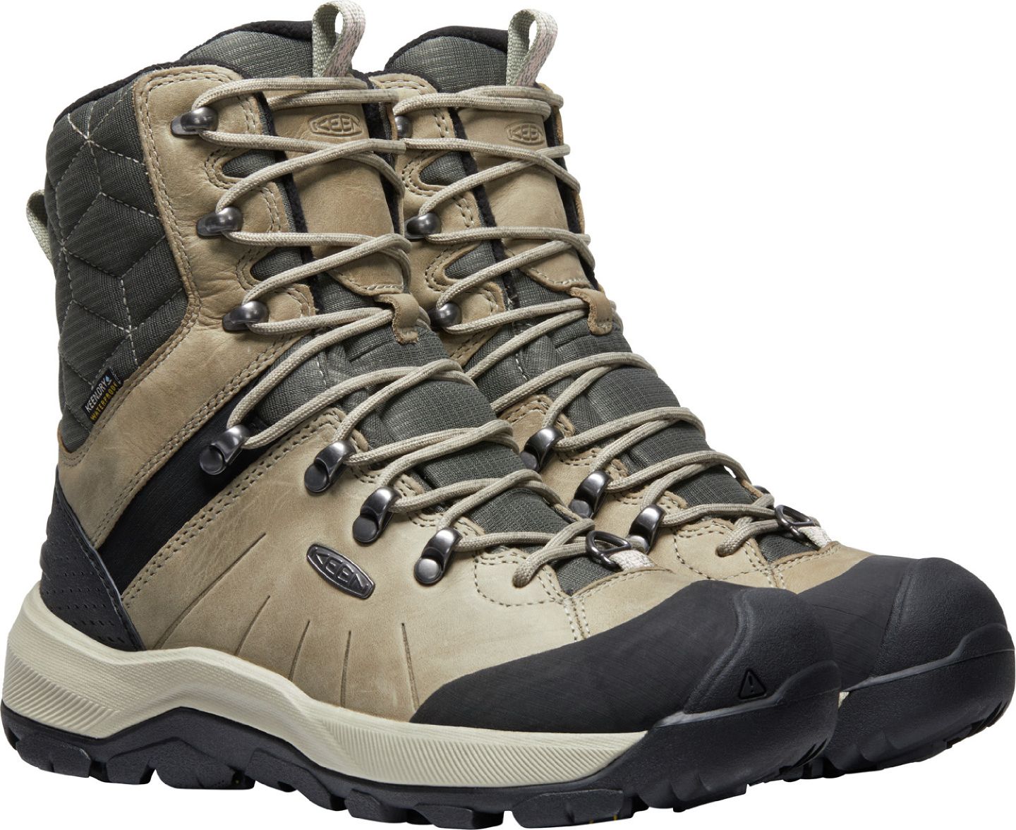 A pair of high-top lace-up boots featuring tan and black leather, a rubber toe cap, and a thick, light-colored midsole.