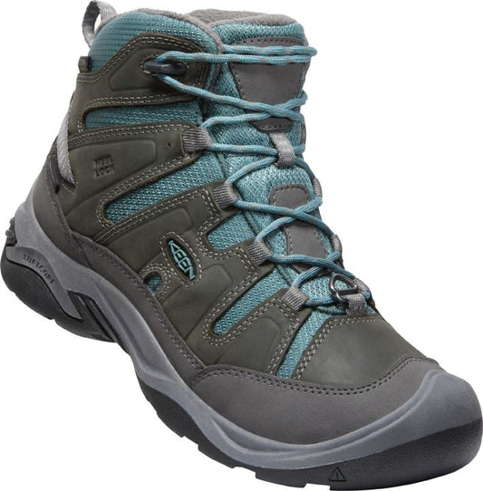 Gray and teal hiking boot with laces.