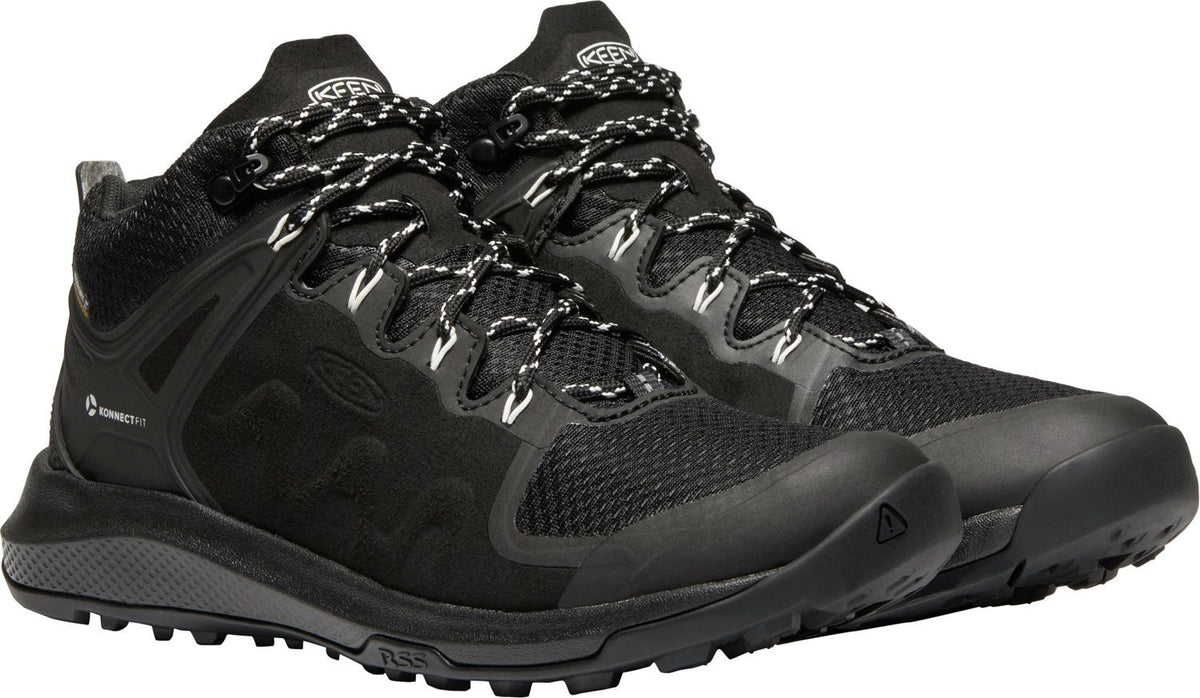 Pair of black hiking boots with black and white laces.