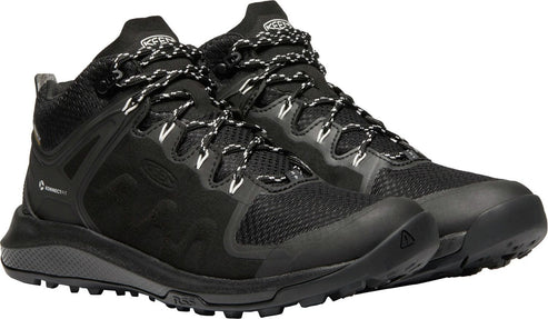 Pair of black hiking boots with black and white laces.