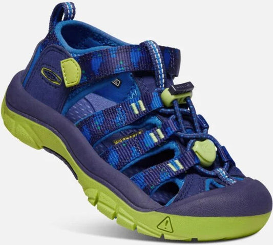 A child's navy blue sandal with a lime green sole, toe, and accents and a blue patterned strap.