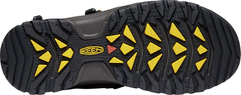 A shoe outsole with a black base and yellow triangle-shaped tread patterns, featuring the KEEN logo.