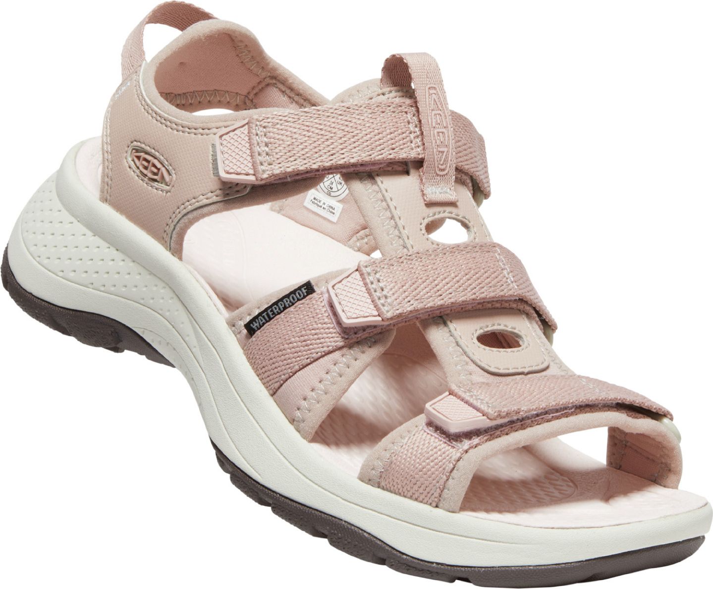A pink waterproof sandal with three hook and loop straps.