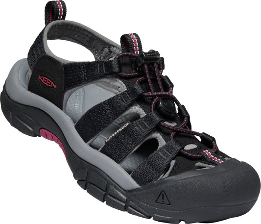 Black and grey waterproof sandal with pink accents, featuring a closed toe, adjustable straps, and a supportive sole.