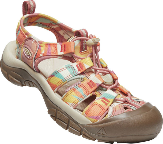Open-toed sandal with multiple striped multicolor fabric straps, a brown rubber toe cap, and a beige sole.