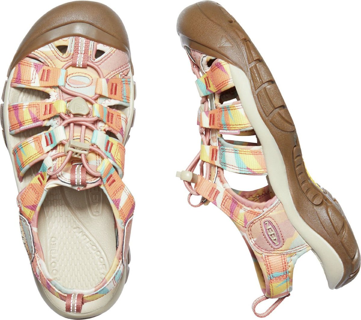 Two colorful Keen Whisper sandals, one showing its sole, the other its footbed.