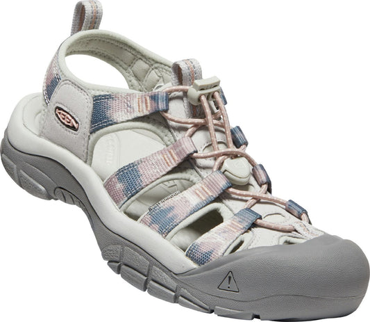 Grey and white sandal with a round toe and tie-up closure.