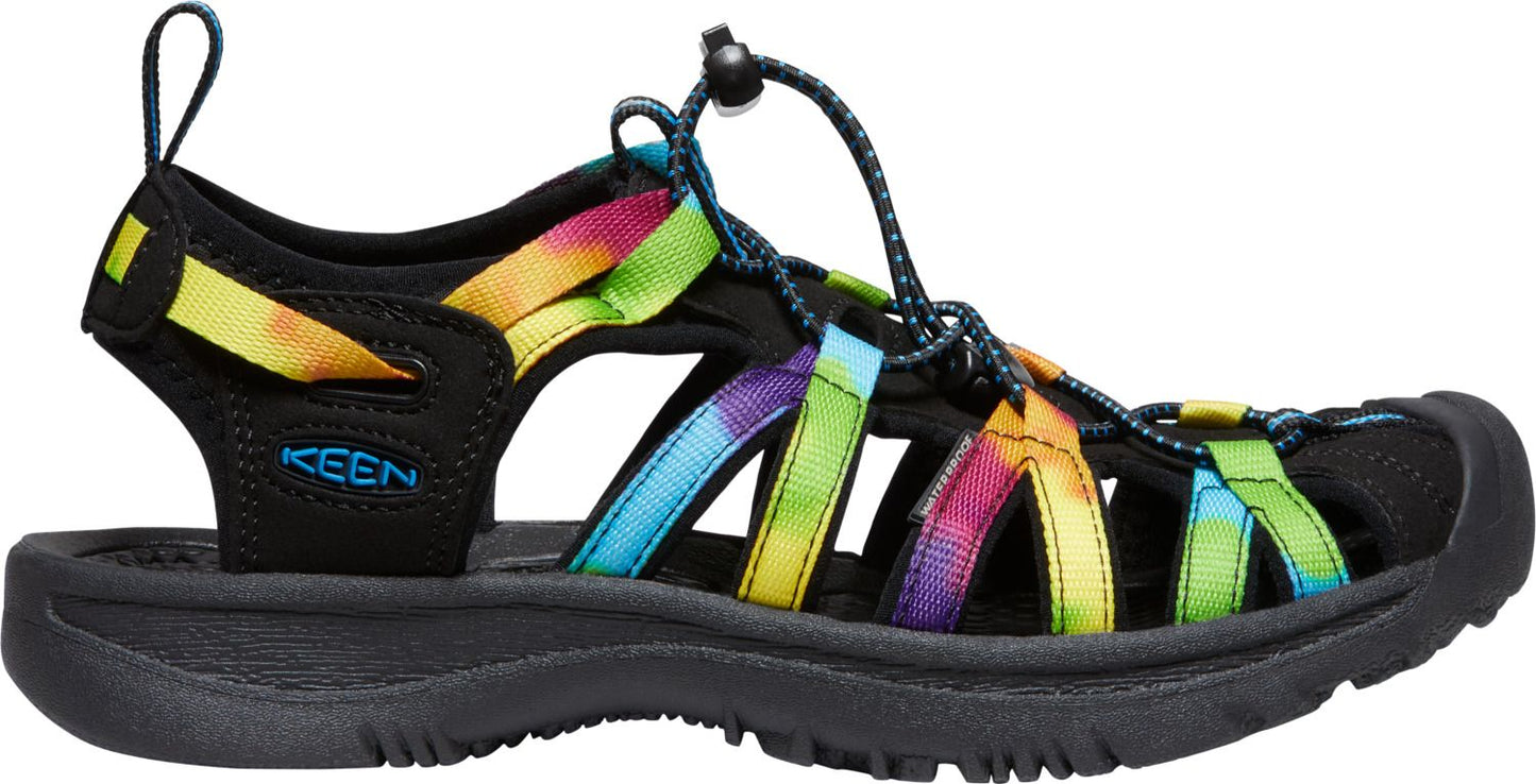 A water shoe with colorful tie dye straps.