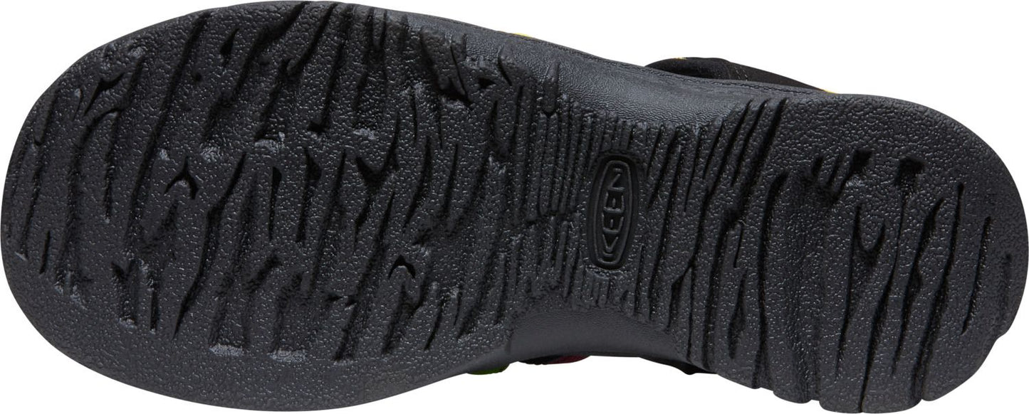 A black shoe sole with a textured tread pattern and the KEEN logo.