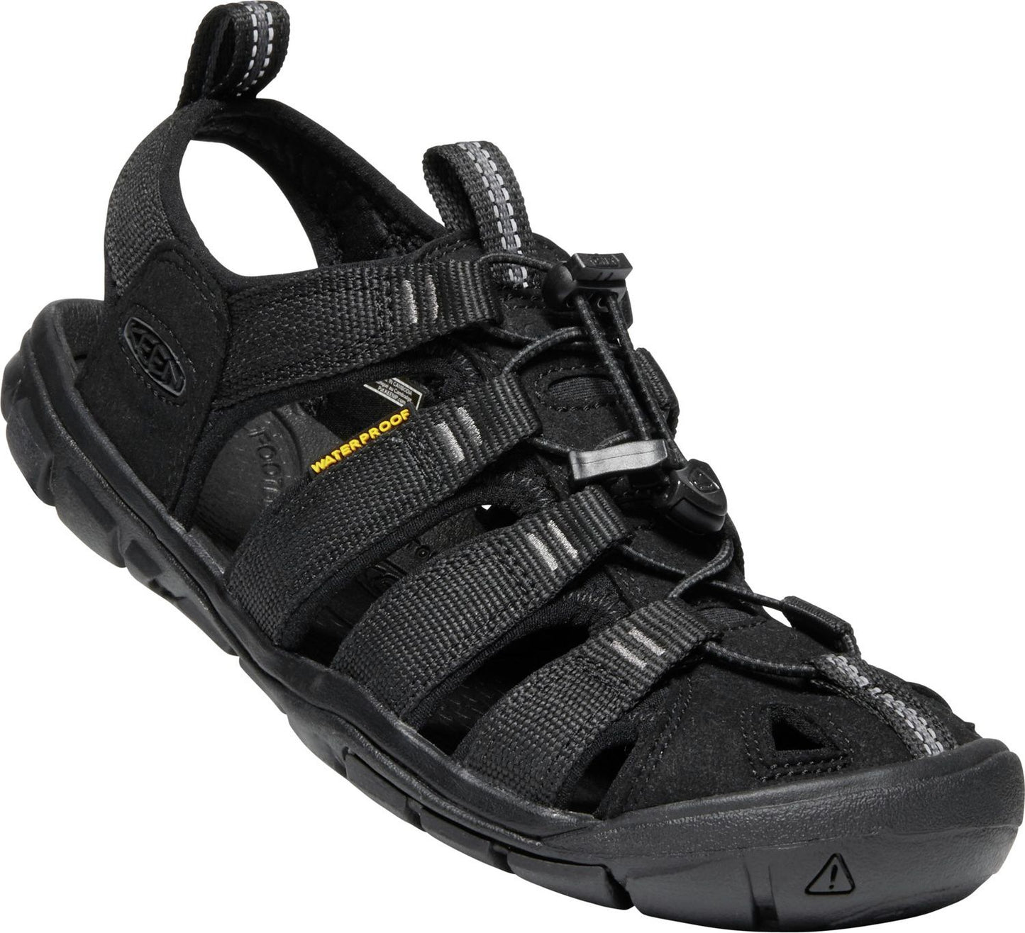 Black sandal with webbed straps and a toggle lacing system.