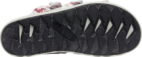 A sandal sole with a geometric pattern.