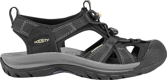 A black sandal with toe coverage.